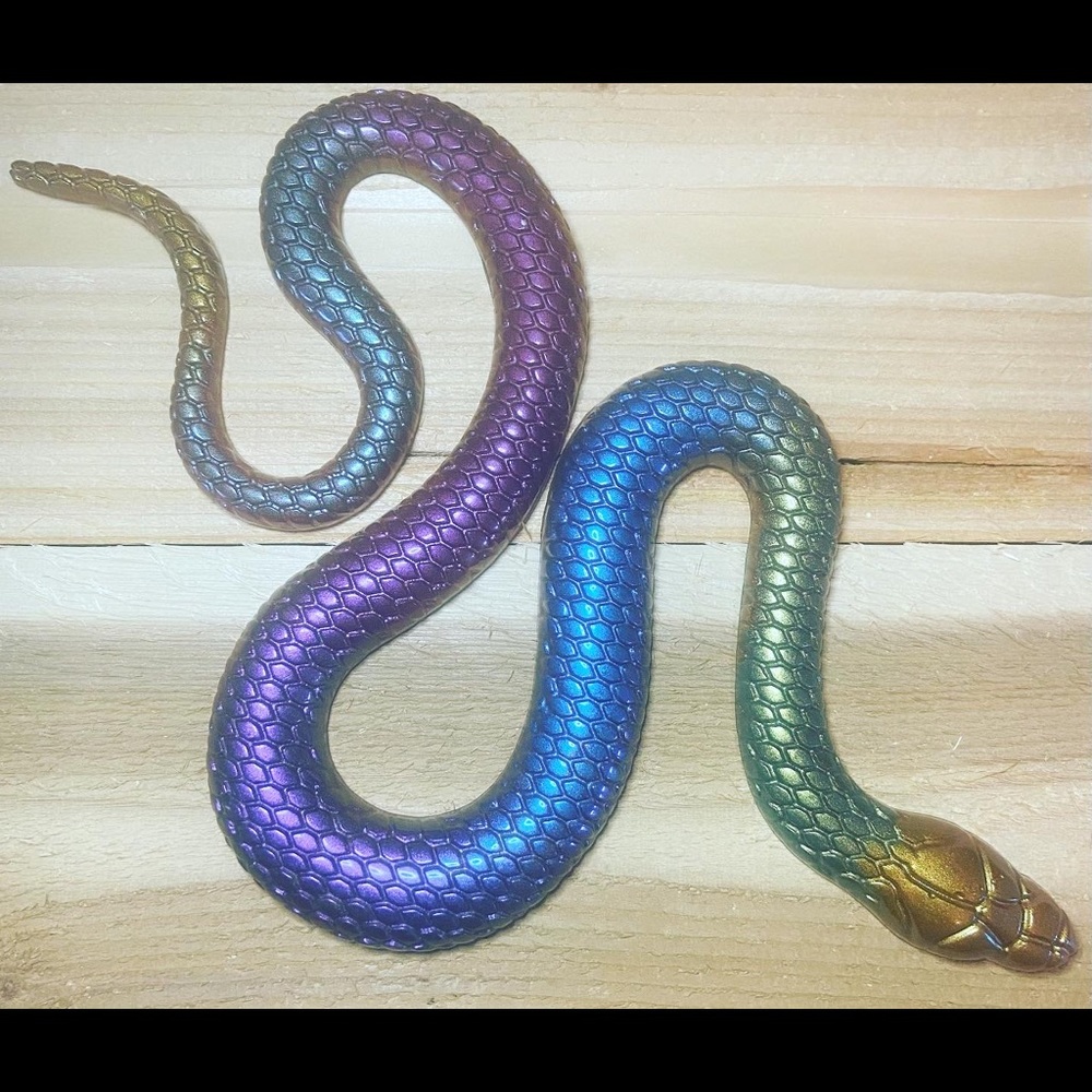 I am selling a beautiful snake. It has gorgeous colors, and is made out of resin